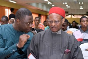 L-R: Mr. Kunle Soriyan engrossed in discussion with Chief Emeka Anyaoku as the latter listens intently at the #IYD2016NG event.