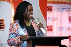 Ms. Sade Morgan, the Legal, Public Affairs and Communications Director of the Nigerian Bottling Company delivering a brand talk during the #IYD2016NG event.